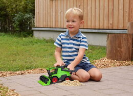 Auto Truckies kombajn plast 20cm s figurkou v krabici 24m+