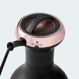 Vysoušeč vlasů Bellissima, 11968 DIFFON Ceramic Dual Voltage, keramická
technologie, 2 teploty/rychlosti, duální napájení, 700 W