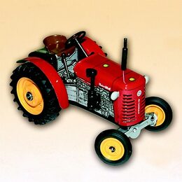 Traktor Zetor 25A červený na klíček kov 15cm 1:25 v krabičce Kovap