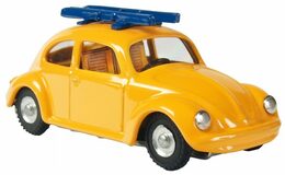 Auto VW brouk s lyžemi kov 11cm žluté v krabičce Kovap