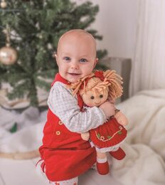Hračka Bigjigs Toys Růžový kabátek pro panenku 28 cm