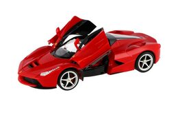 Auto RC Ferrari červené plast 32cm 2,4GHz na dálk. ovládání na baterie v krabici 43x19x23cm