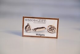 Wooden City 3D dřevěné mechanické puzzle 3 mechanické přívěsky na klíče