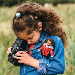 Lottie Panenka fotografka s naslouchadlem