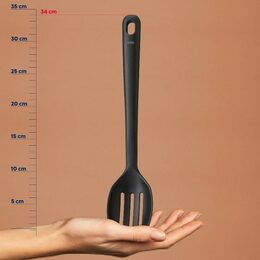 KELA Servírovací lžíce Apart s drážkami plast černá KL-12633